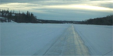 Winter Road Across the Lake and River Ice